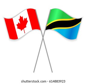 Canadian and Tanzanian crossed flags. Canada combined with Tanzania isolated on white. Language learning, international business or travel concept.
