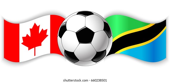 Canadian and Tanzanian wavy flags with football ball. Canada combined with Tanzania isolated on white. Football match or international sport competition concept.