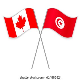 Canadian and Tunisian crossed flags. Canada combined with Tunisia isolated on white. Language learning, international business or travel concept.