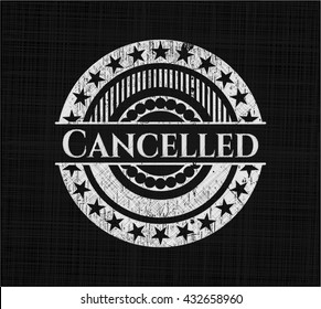 Cancelled chalk emblem written on a blackboard