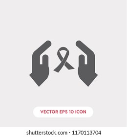 Cancer ribbon with hands vector icon
