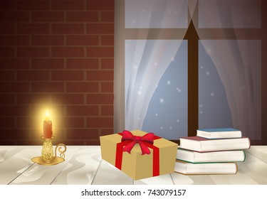 Candelabra with pile of book and gift box on the table in winter season background