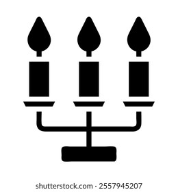 Candelabra silhouette with three candles. Concept of light, celebration, and decoration.