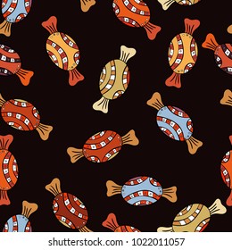 Candies on black, orange and beige colors. Vector. Cute cartoon colorful seamless vector pattern with candies and cotton candy.