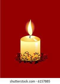 Candle with flame on a burgundy background