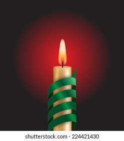 Candle with green spiral tape on dark background