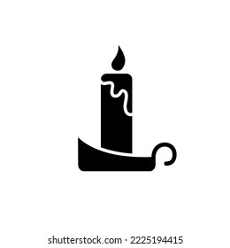 Candle with holder glyph icon. Happy new year and Christmas decoration. Halloween design. Season holiday. Black silhouette symbol. Isolated vector stock illustration