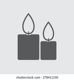 Candle icon with flame. Vector Illustration of two burning candles. 