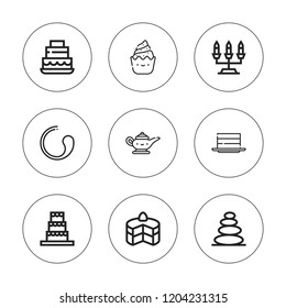 Candle icon set. collection of 9 outline candle icons with candelabra, cake, magic lamp, muffin icons. editable icons.