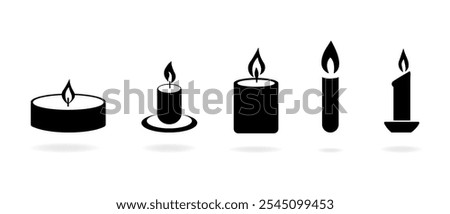 Candle icons set. Candle silhouette. Candles flaming vector.