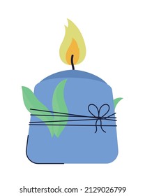 candle with leaves over white