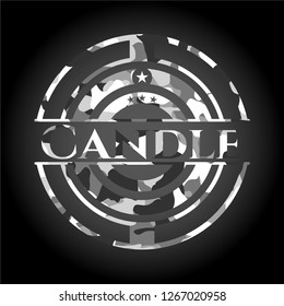 Candle on grey camo pattern