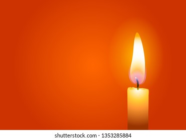 Candle on orange background