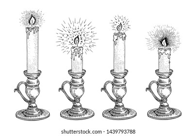 Candle sketch set. Hand drawn vector illustration of a burning candle with rays of light in vintage style