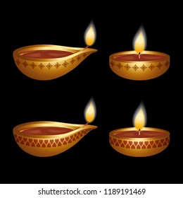 Candle in small pots decorated with abstract pattern and heart, for the festival of light in India, Diwali.