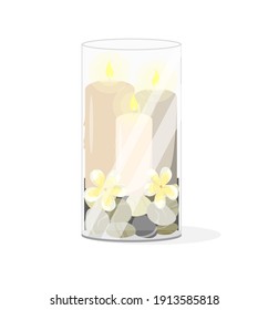 Candles in a glass vase in water with stones and flowers. Decor. Spa