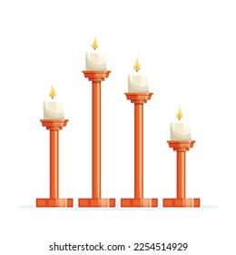 Candles placed on different heights of wooden candlesticks