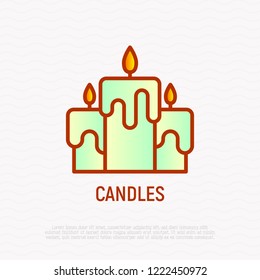 Candles thin line icon. Modern vector illustration of Christmas decoration.