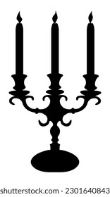 candelabro con velas de estilo clásico en silueta negra para diseño interior