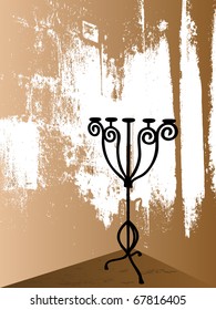 Candlestick on the grunge background