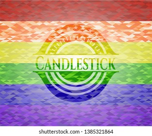 Candlestick on mosaic background with the colors of the LGBT flag