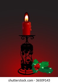 Candlestick with twig of holly on dark background