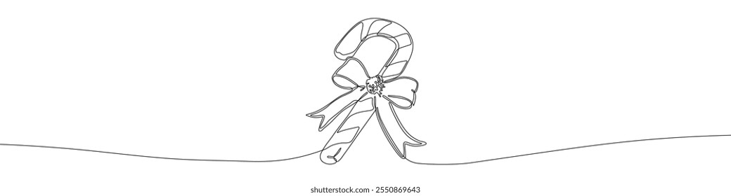 Candy cane continuous line drawing vector illustration. Christmas and New Year sweets or decoration