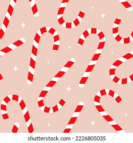 Candy cane holiday wallpaper. Christmas seamless pattern with candys. EPS 10.