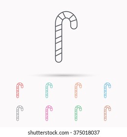 Candy cane icon. Sugar lollipop sign. Sweet lolly pop symbol. Linear icons on white background.
