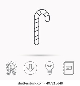 Candy cane icon. Sugar lollipop sign. Sweet lolly pop symbol. Download arrow, lamp, learn book and award medal icons.