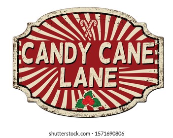 Candy cane lane vintage rusty metal sign on a white background, vector illustration