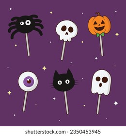 Candy cane lollipop happy Halloween trick or treat concept. Halloween related characters, ghosts, spiders, black cats, pumpkins, eyeballs, skulls.