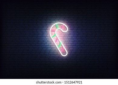Candy cane neon icon. Glowing Christmas winter holiday icon sign