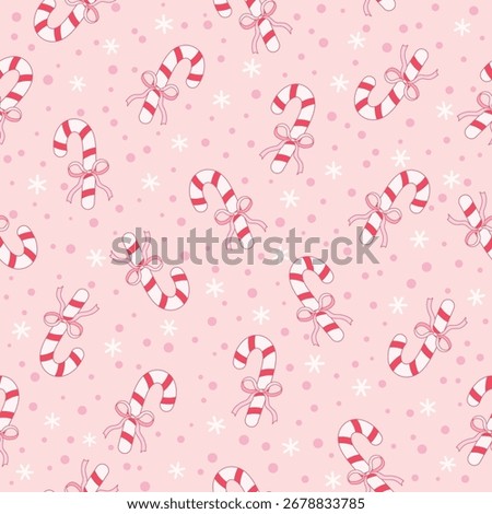 Candy cane with pink bow seamless pattern for Christmas background.
