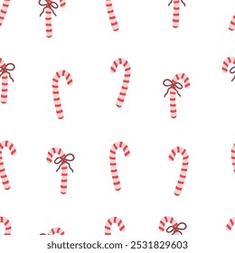 Candy cane with red bow seamless pattern. Christmas sweets backdrop. Festive ornament with candies on white background.  