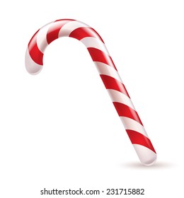 Candy cane with red and white stripes. Christmas sweet treat.