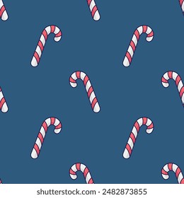 Candy cane seamless pattern. Caramel stick, lollipop illustration in doodle style. Hand drawn candy cane on blue background. Christmas texture, textile design