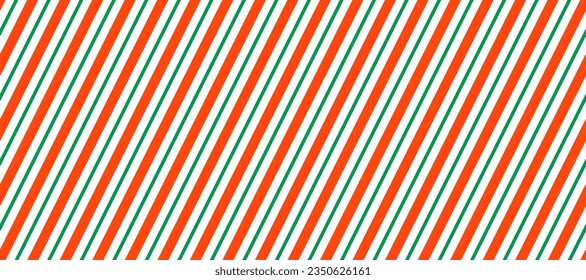 Candy cane seamless pattern. Red and green diagonal stripes background. Christmas repeating decoration texture. Winter holiday lines backdrop. Xmas peppermint package wrapping print. Vector wallpaper