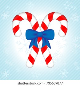 candy canes  with blue  bow
