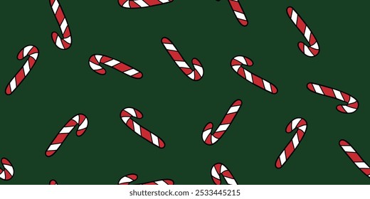 Candy canes on green seamless pattern, doodle style vector