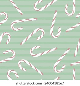 Candy canes on green stripe background vector seamless pattern