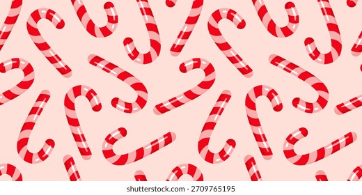 Candy Canes em fundo rosa. Feliz Natal e Feliz Ano Novo design para papel de embrulho, embalagem, papel de parede, têxtil, tecido, notebook, cartões de felicitações