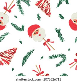 Candy canes and twigs seamless pattern. Christmas decor background. Vector