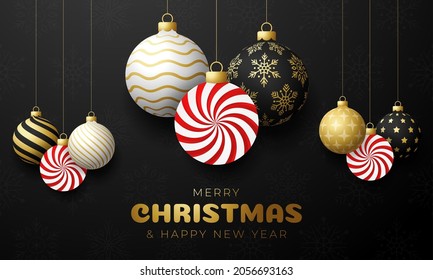 Candy Christmas card. Merry Christmas sweet greeting card. Hang on a thread mint candy lollipop ball as a xmas ball and golden bauble on black horizontal background. Vector illustration.