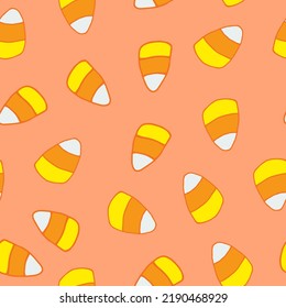 candy corn seamless pattern. background hand drawn in doodle style. halloween holiday decor