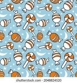 Candy Halloween Seamless pattern. Candy and lollipops on starry blue background. Trick or Treat cartoon vector repeated Illustration for celebratory textile, wrapping paper, wallpaper.