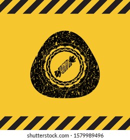 candy icon black grunge emblem with yellow background. Vector Illustration. Detailed.