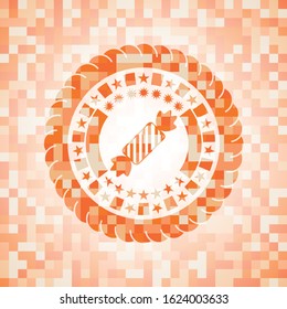 candy icon inside abstract orange mosaic emblem