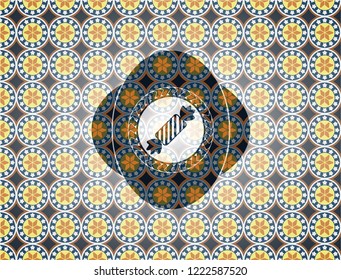 candy icon inside arabic style badge. Arabesque decoration.