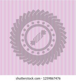 candy icon inside badge with pink background